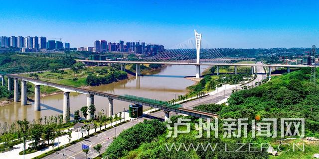 铁路等交通设施,跨越沱江,构建多元化的城市交通组织 泸州日报 记者