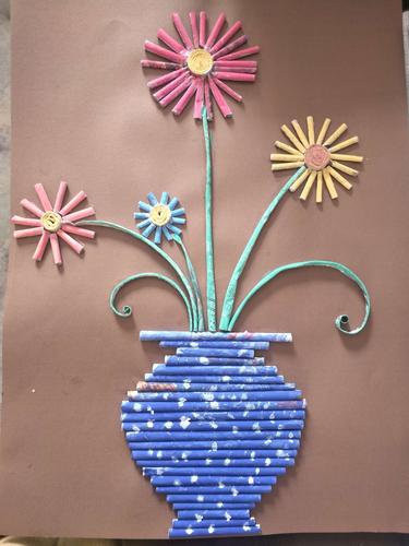 与绿色共行 与环保相约――"变废为宝社团"活动二《报纸画》