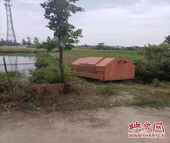 垃圾箱变"路霸" 确山县热线办解民忧