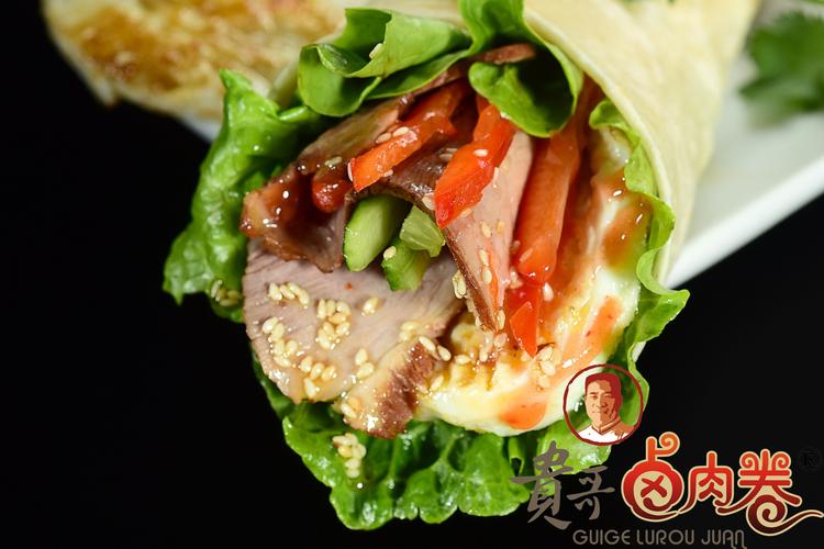 湖南卷饼加盟哪家好贵哥卤肉卷风靡全国图