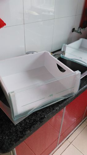 海尔冰箱里抽屉盒子上透明罩如何拆下来清洗