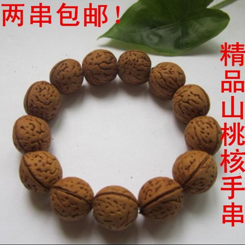 下图是20元桃核手串 点击图片即可看到