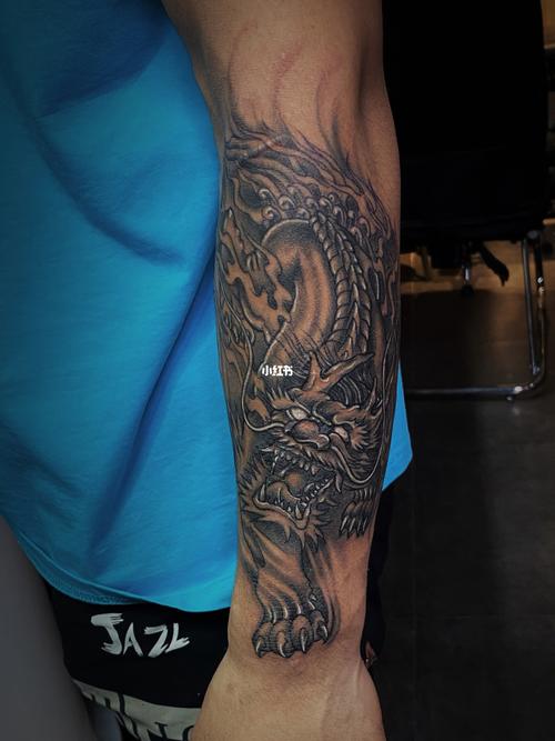 手臂麒麟纹身_纹身_西界刺青自由行热门攻略_刺青_搏击_我的纹身分享