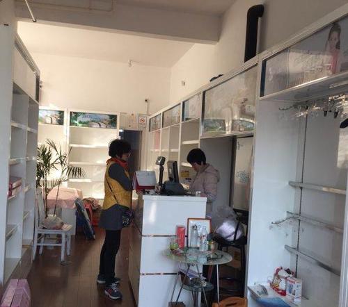 家纺店高档烤漆货柜收银台展示床