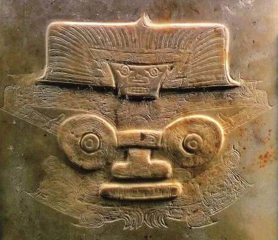 整个良渚文化遗址中各种玉器上简化或抽象的类似神徽的大小图案,便