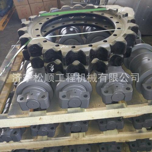供应挖掘机配件四轮一带 sk200 支重轮引导轮履带链条