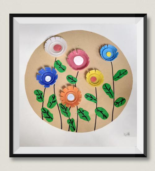 变废为宝,环保校园————创意美术之瓶盖画