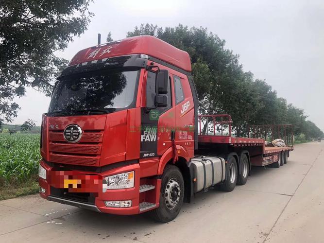 出售10个月420马力解放牵引车带18年8月13.75米平板半挂车