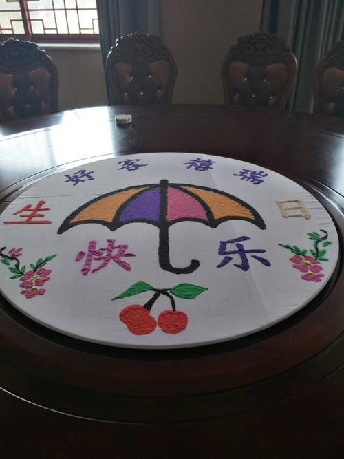 禧瑞大酒店的服务人员设计并制作的沙画