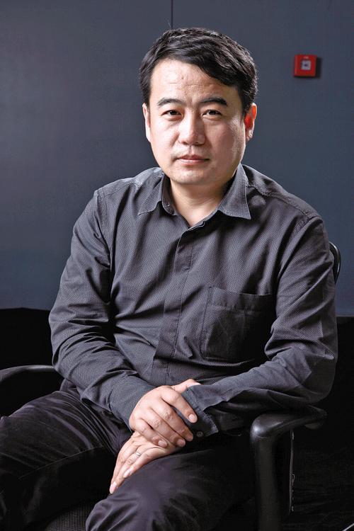 建筑师李少云强调"建筑本土化"