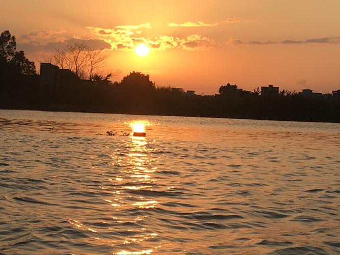 三亷公园江边的夕阳