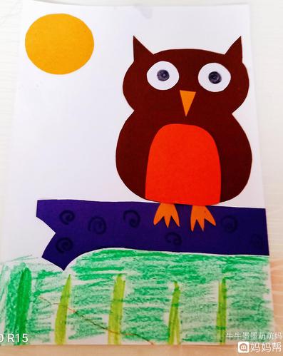 用铅笔在褐色卡纸上画出猫头鹰