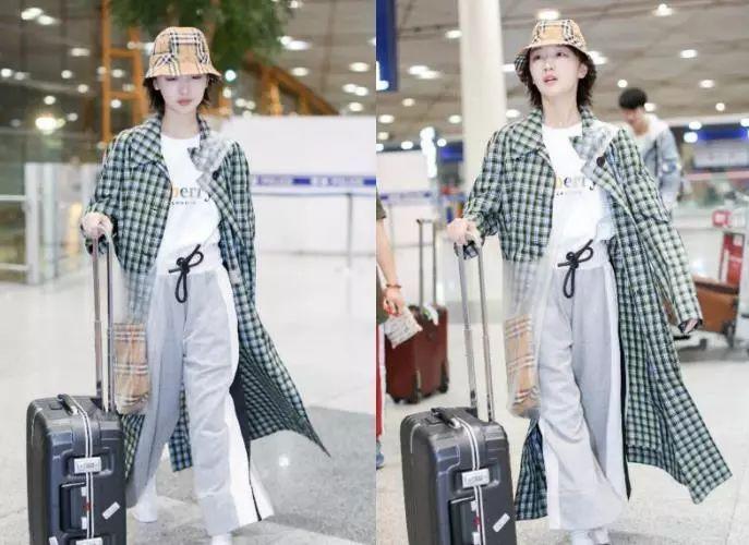 女星遇到行李箱,娜扎女汉子,倪妮有些费力,热巴全副武装