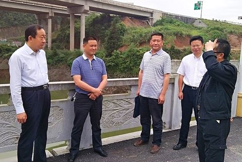 古丈县副县长,县防汛抗旱指挥部指挥长周大钊,县水利局分管领导及相关