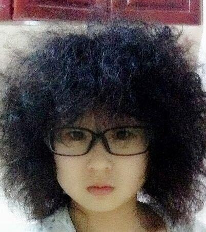 拥有一头自然卷卷头发是一种什么体验?