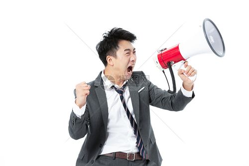 商务男性拿着喇叭大声说话