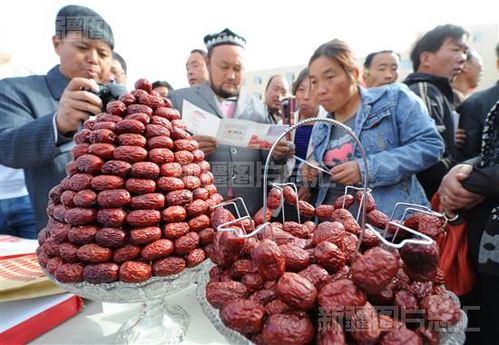 组图说明:   当日,若羌县        兰红枣节开幕.
