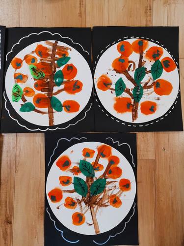 佳育幼儿园本周美术活动——"柿子熟了"