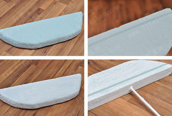 5,继续利用剩余的白色珍珠棉泡沫,制作两瓣船帆.