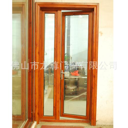 佛山厂家直销铝合金平开子母门中空钢化玻璃黄花梨木纹色保用20年