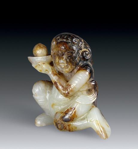 唐玉胡人献宝高 7 cm.