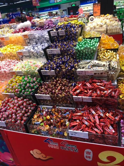 奓山店休闲食品散装陈列图片