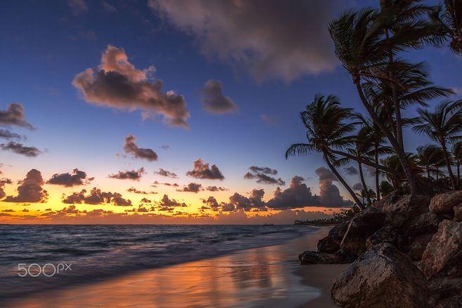 sunrise on the beach of caribbean sea by valentin