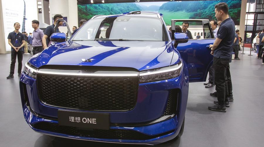 理想汽车"敲钟",国产电动车上市竞速