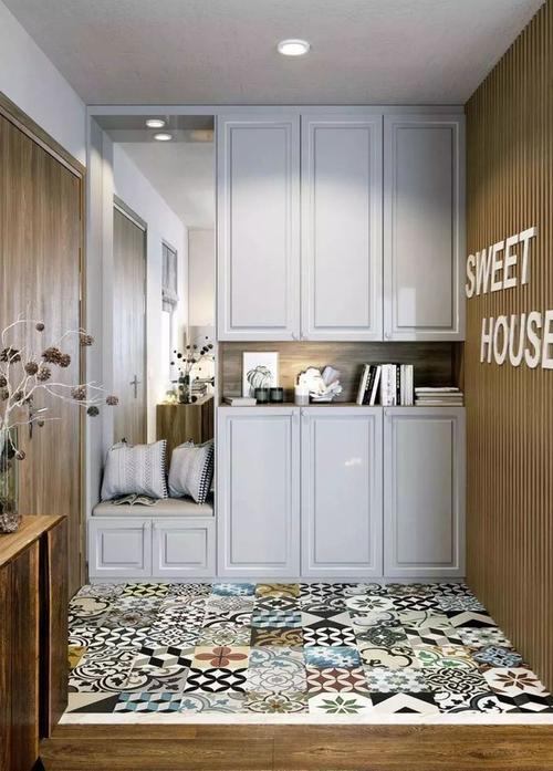 如果可以,建议大家将换鞋凳可以收纳在柜子的下端位置,可以避免进门被