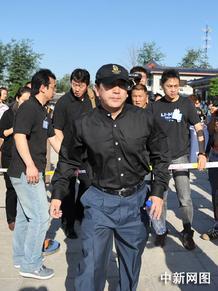 央视主持人水均益参加罗京追悼会.中新网记者 金硕 摄