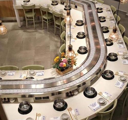 麻姐辣媚旋转小火锅加盟图片_店面装修图片-全球加盟网