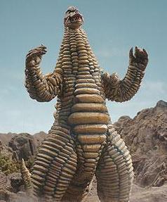 雷德王最早出现在初代tv里,一开始的设定是号称有【撕裂宇宙的强大