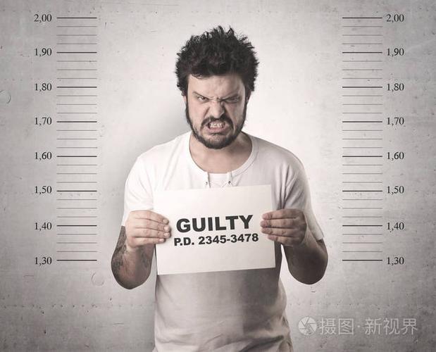 在监狱中被捕罪犯照片-正版商用图片09obg6-摄图新视界