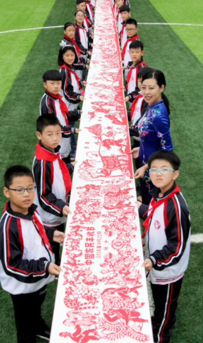 巨幅剪纸作品《中国农民丰收节》亮相山东