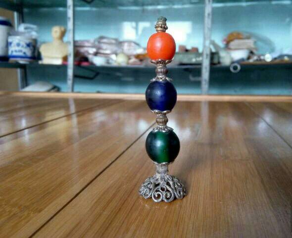 为何有的顶珠是好几个珠子?