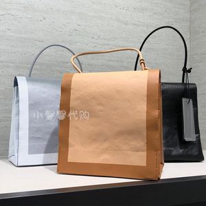 新加坡小ck牛皮纸袋新款斜挎女包ck2-50670914复古褶皱杜邦翻盖包