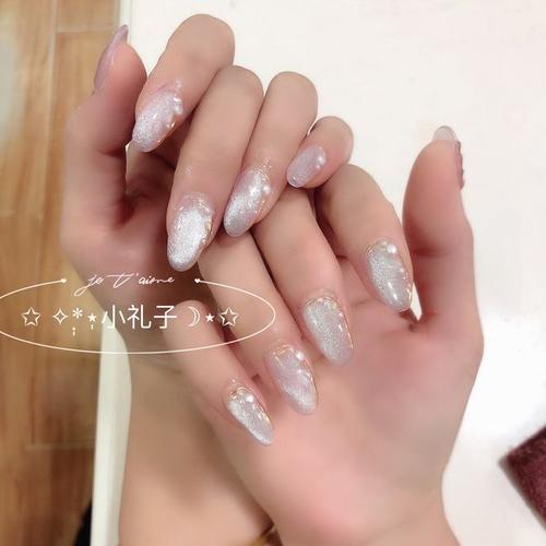 晶石猫眼气质椭圆形美甲图片