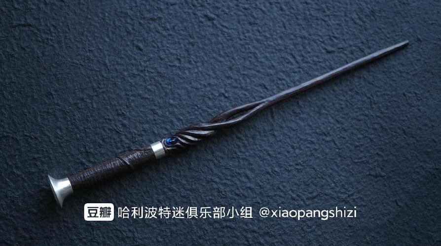 "黑檀木,13又1/2英寸,凤凰羽毛核心,令人意想不到的坚韧!