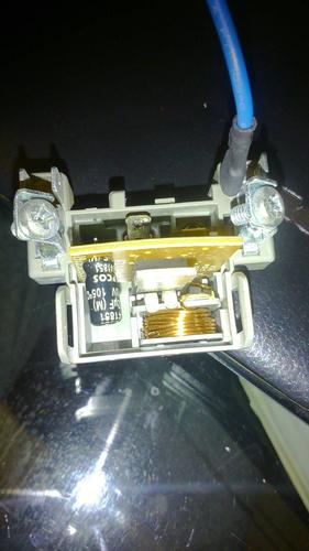 这个是冰箱上什么类型的启动器?怎么里面既有电路板也有线圈?