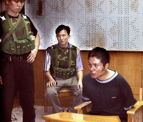 面容凶悍的张君