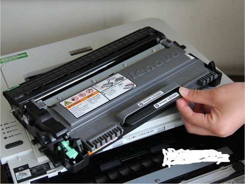 联想lj2400激光打印机怎么取出卡纸.最好附图谢谢.
