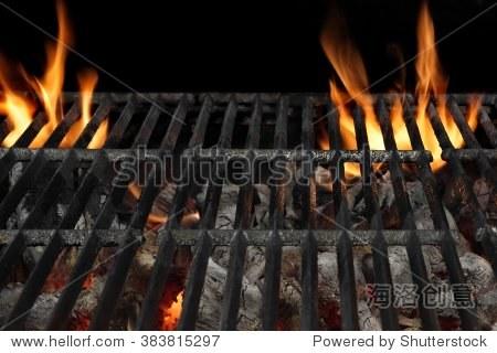 empty bbq flaming charcoal grill with bright flames of fire