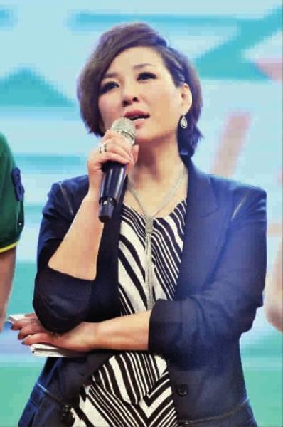"■和工作上的老搭档戴军在一起◆周曼妮 叶子她是睿智亲和的主持人