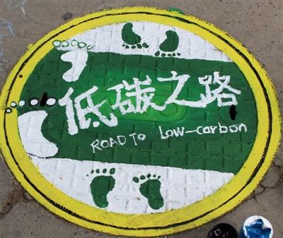 吴忠:创意井盖涂鸦志愿服务