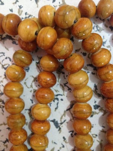 陶到一串虎骨手串.卖家说的是虎骨请名家给鉴定一下多谢!