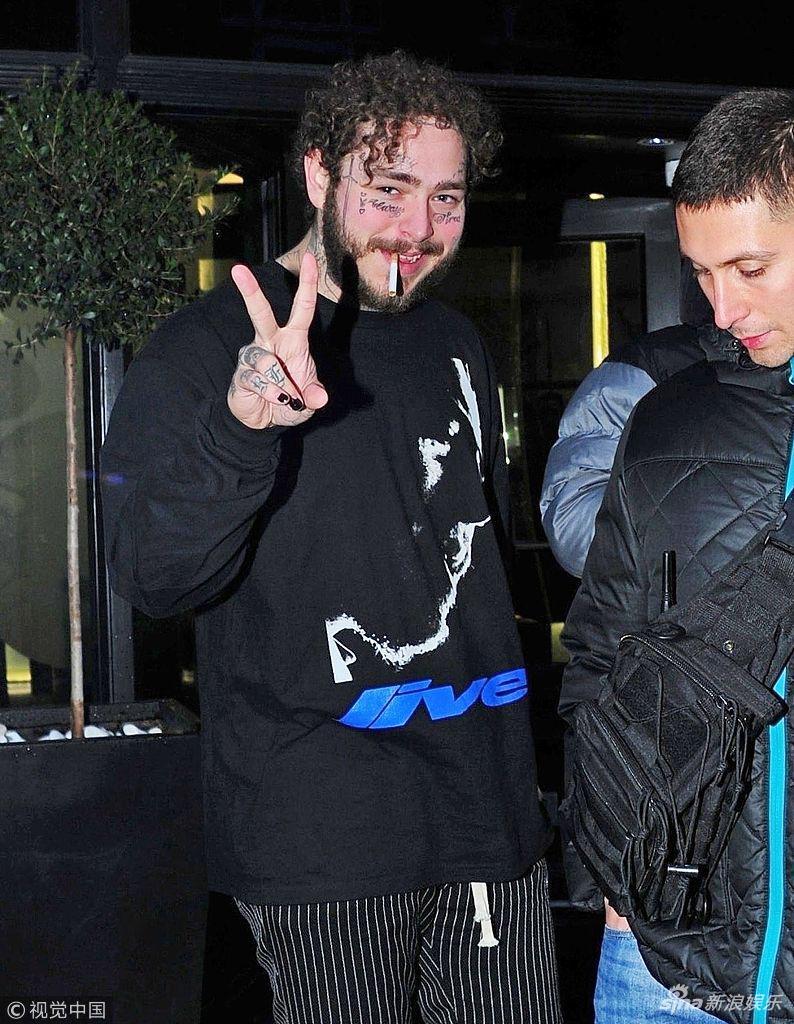 组图:波兹·马龙现身伦敦惹争执 被警方"点名"叼烟比v