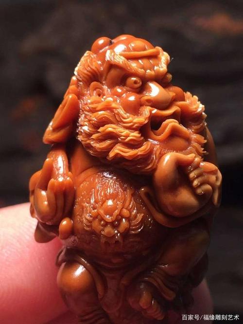 橄榄核雕刻十大名家排名——「妙女」大师本工《御龙