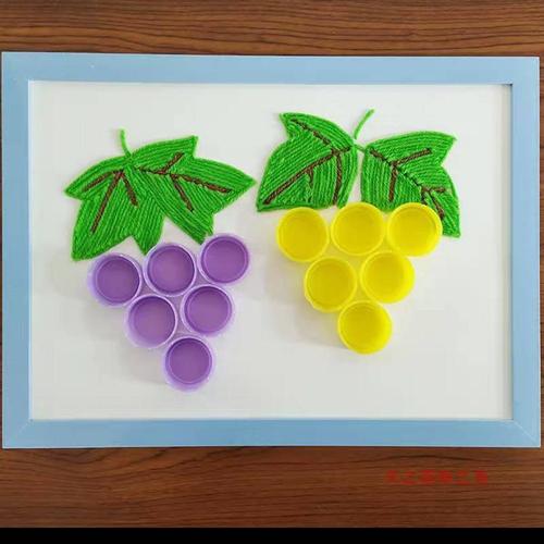 二年级:环保瓶盖创意手工制作.