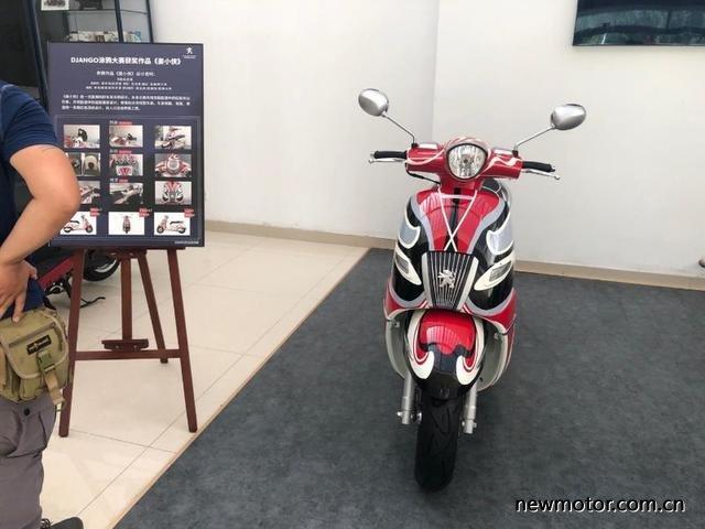 姜戈代表的标致摩托已成为摩托回归城市的代表