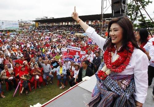 他信妹妹成泰国首位女总理宣布组建5党联合政府